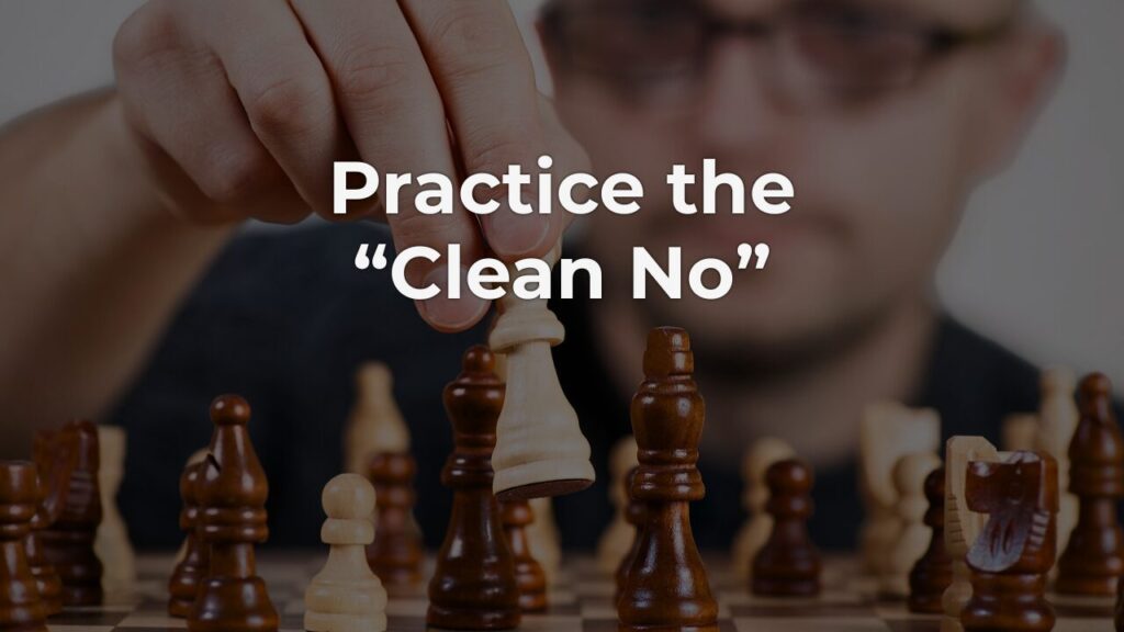 A steady hand pausing above a chess piece mid-game, capturing the deliberate restraint of a clean no