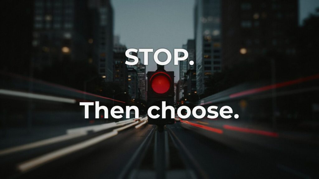 A red traffic light glows sharply against streaking, blurred city traffic at dusk, overlaid with the words "Stop. Then choose," capturing composure in the half-second before reacting.