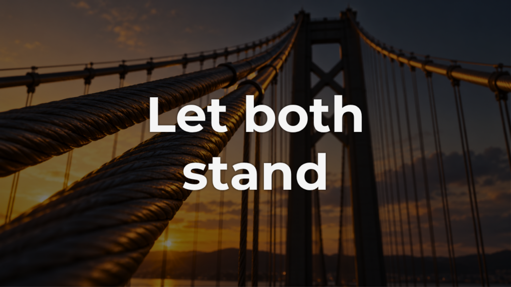 Thick braided steel cables of a suspension bridge stretching toward a tall tower at sunset, the kind of opposing tension that makes holding two truths possible.